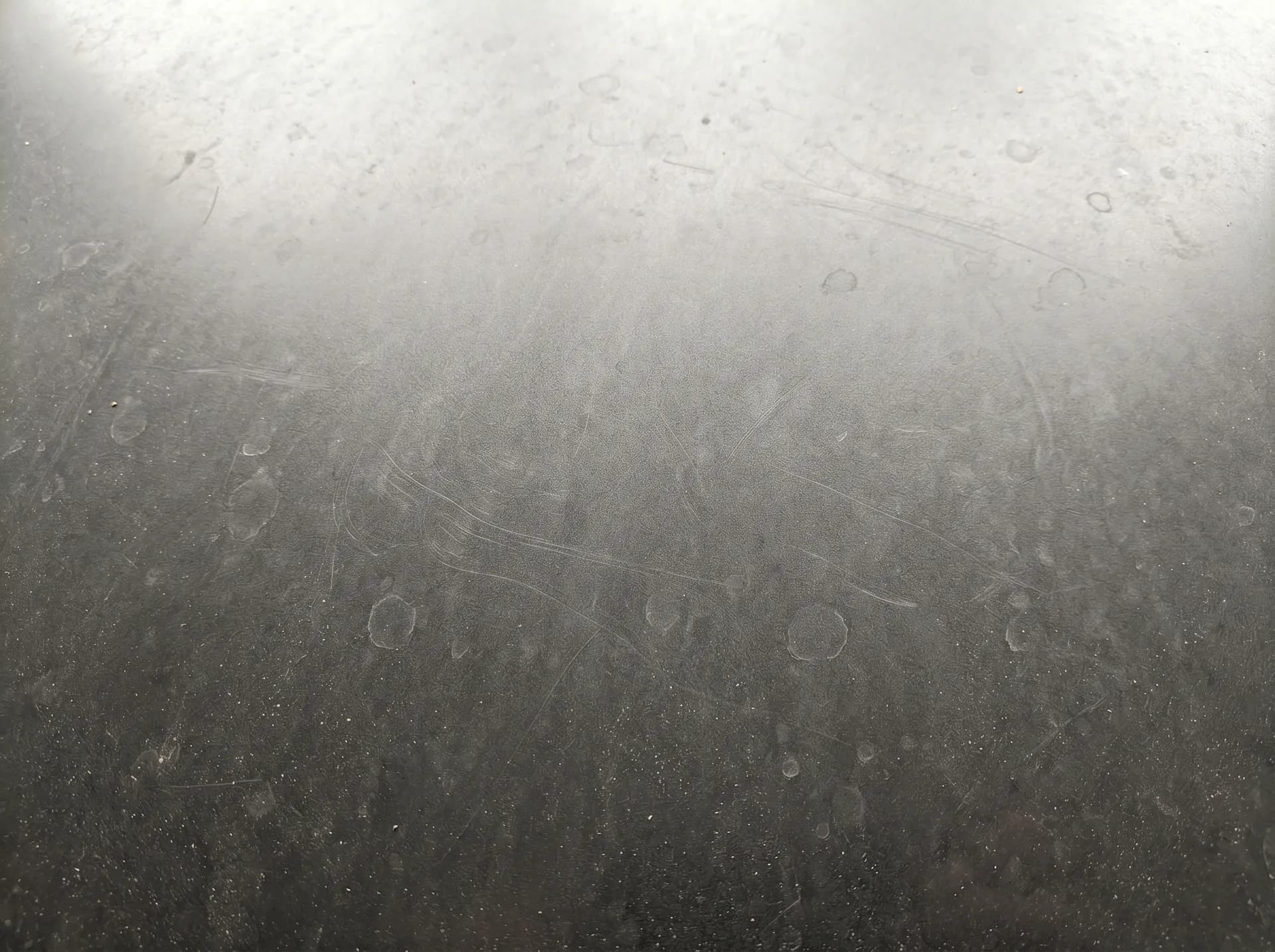 Dull paint with swirl marks from improper washing before correction
