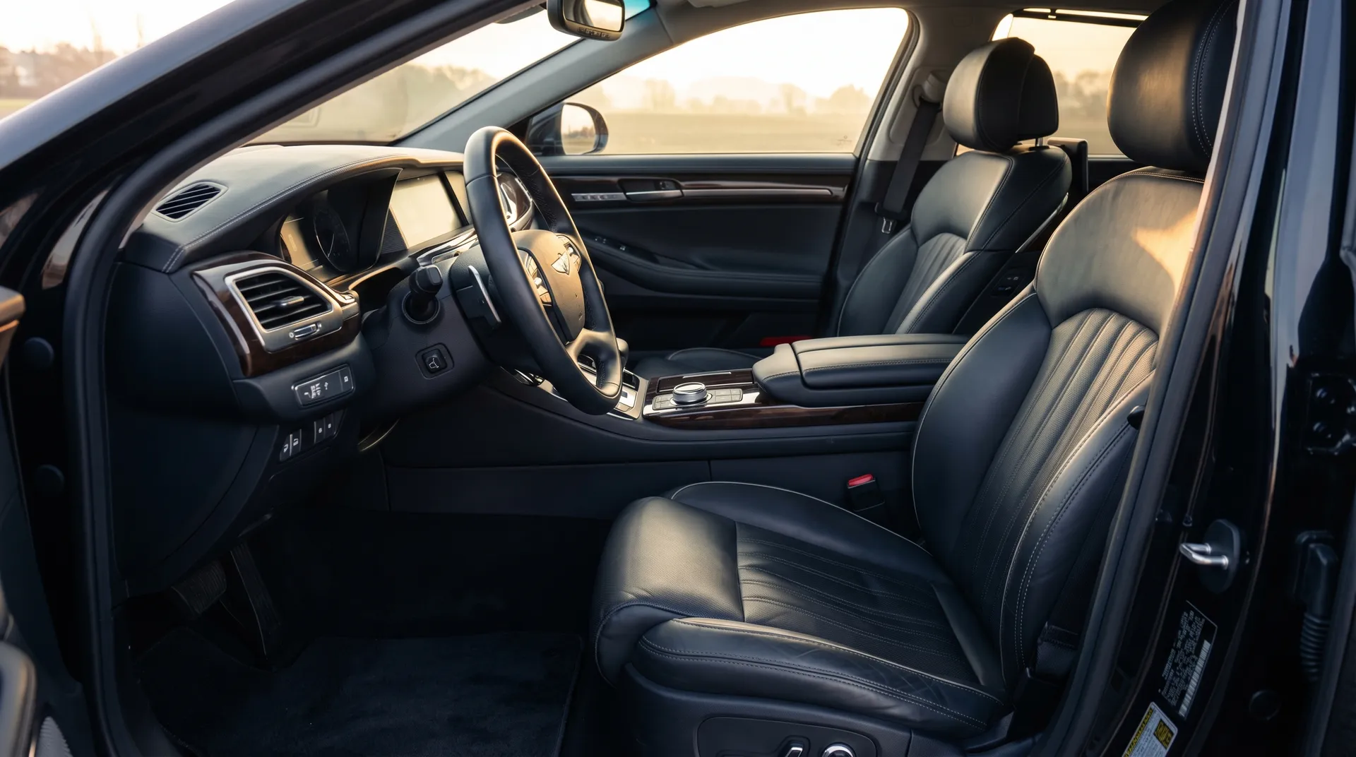 Detailed leather interior of a luxury car being conditioned